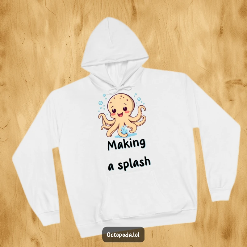 Funny Hoodie: A happy octopus joyfully sprays water like a playful fountain, offering cozy fun.