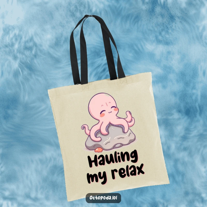 Funny tote bag showcasing a relaxed octopus character lounging peacefully on a rock on the ocean floor.